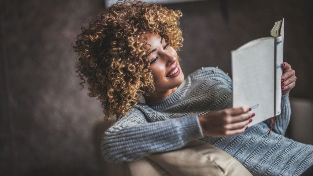 My EHI Aloha 1280 x 720 Woman Reading Hardcover 1