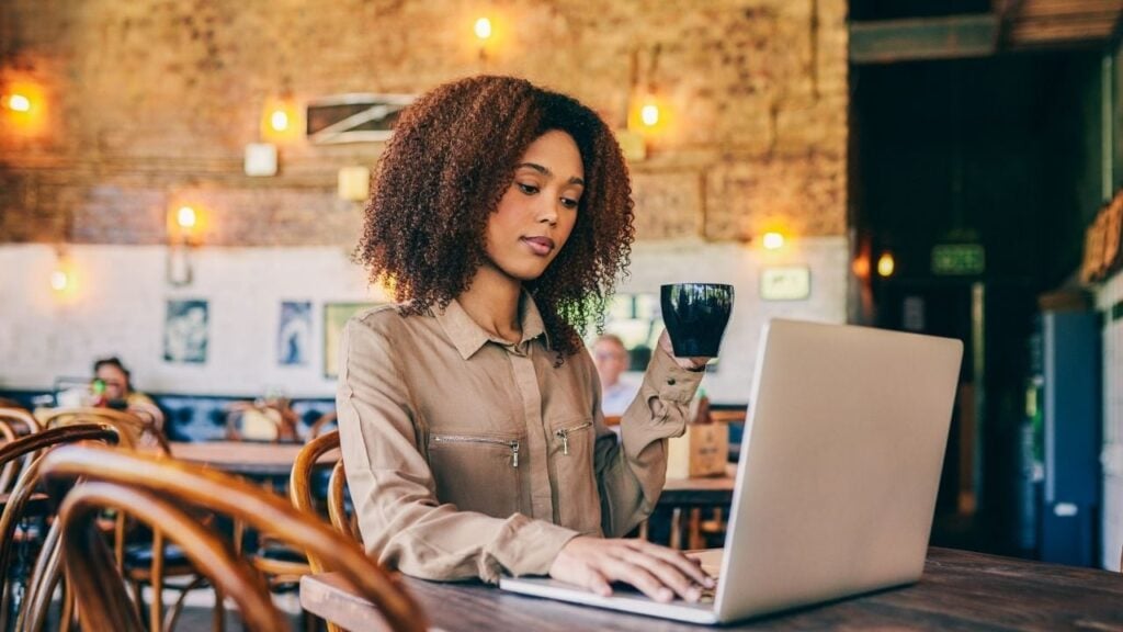 My EHI Aloha 1280 x 720 Woman Working with Computer in Coffee Shop 1